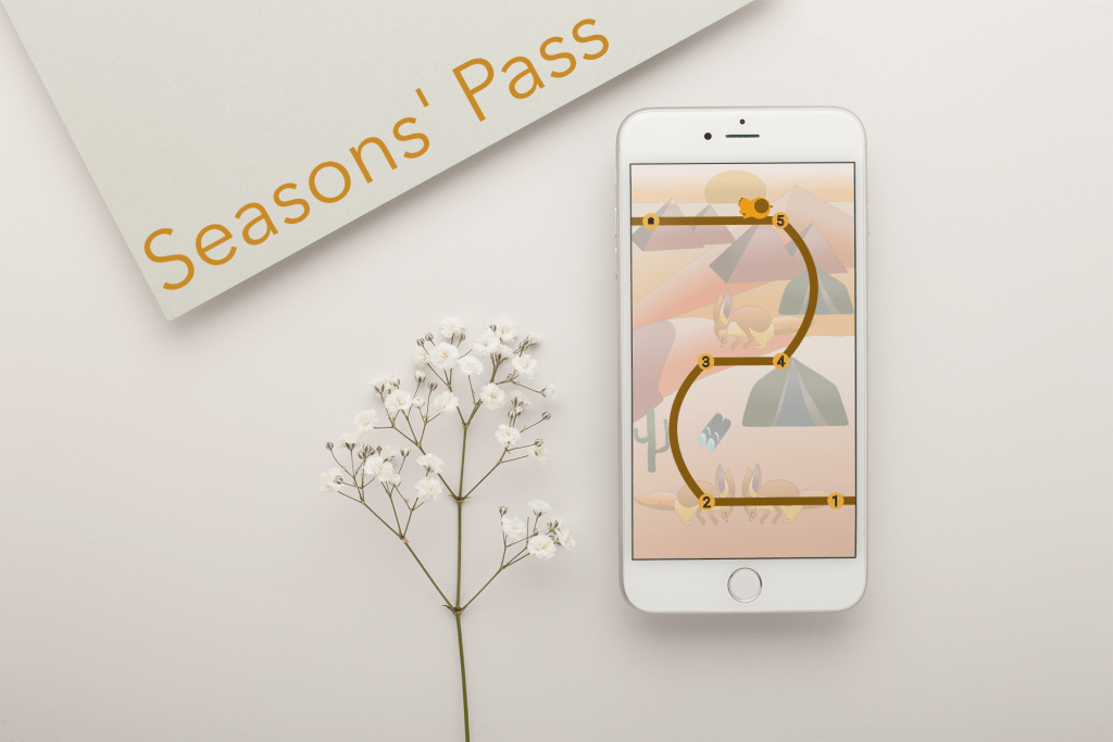 This image has an empty alt attribute; its file name is silver-iphone-mockup-lying-next-to-small-white-flowers-22019-1024x683.png